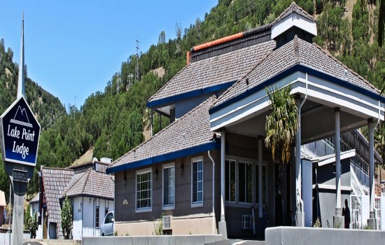 Lake Point Lodge - Exterior - Sign + Carport Roadside 4